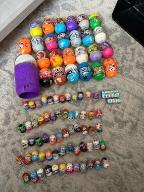 Huge lot of 62 Mighty Beans vintage toys with  carry capsules and case and more